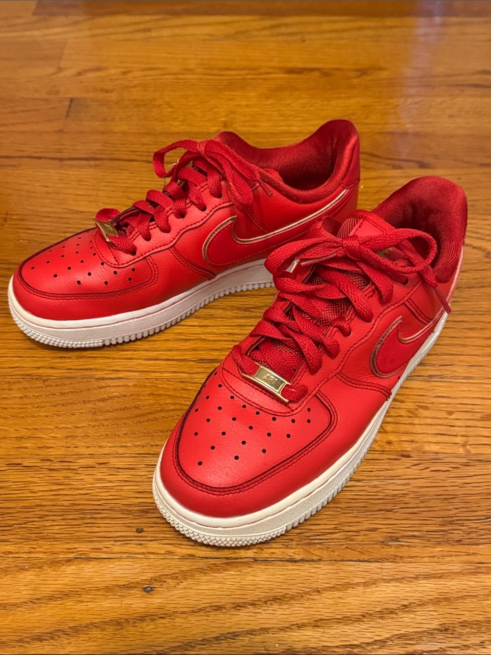 Nike Women’s Red Leather Air Force 1 Low Sneakers with Gold Trim